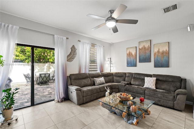 10468 W 33rd Ln, Hialeah, FL 33018 - living area featuring ceiling fan, plenty of natural light, and light tile patterned floors