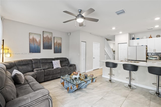 10468 W 33rd Ln, Hialeah, FL 33018 - living room with ceiling fan, recessed lighting, and light tile patterned floors