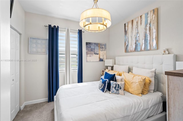 10468 W 33rd Ln, Hialeah, FL 33018 - bedroom with carpet floors and a chandelier