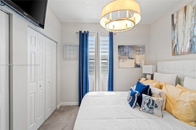 10468 W 33rd Ln, Hialeah, FL 33018 - carpeted bedroom featuring a closet and a chandelier