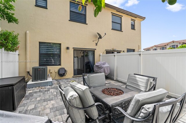 10468 W 33rd Ln, Hialeah, FL 33018 - view of patio / terrace featuring a fire pit and a grill