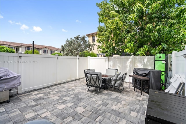 10468 W 33rd Ln, Hialeah, FL 33018 - fenced backyard featuring a patio, outdoor dining area, and area for grilling
