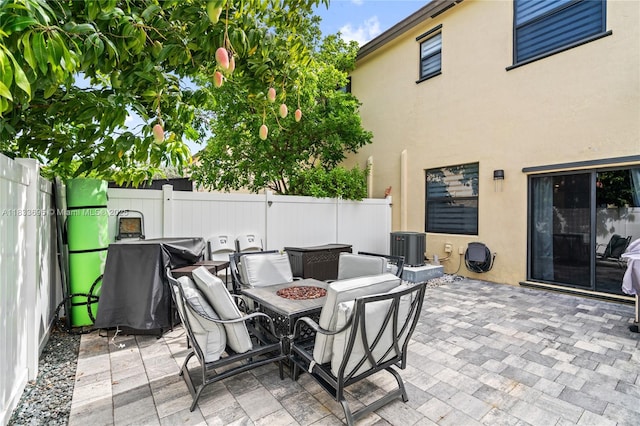 10468 W 33rd Ln, Hialeah, FL 33018 - fenced backyard featuring an outdoor fire pit and a patio