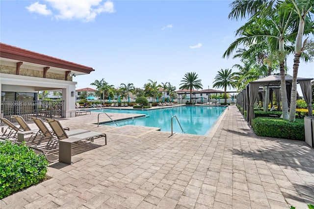 10468 W 33rd Ln, Hialeah, FL 33018 - community pool with a gazebo and a patio area