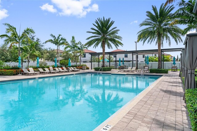10468 W 33rd Ln, Hialeah, FL 33018 - community pool with a patio