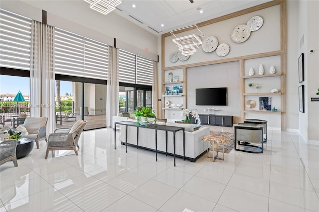 10468 W 33rd Ln, Hialeah, FL 33018 - living area with a high ceiling, light tile patterned floors, and recessed lighting