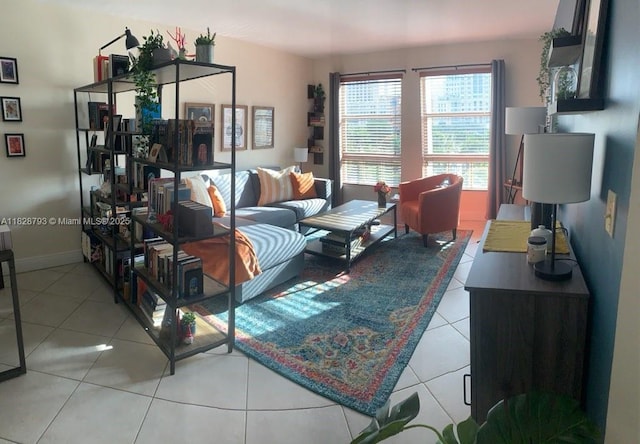 2351 Douglas Rd Unit 505, Miami, FL 33145 - living room featuring tile patterned floors and baseboards