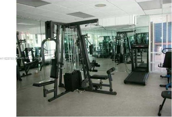2351 Douglas Rd Unit 505, Miami, FL 33145 - gym with a paneled ceiling