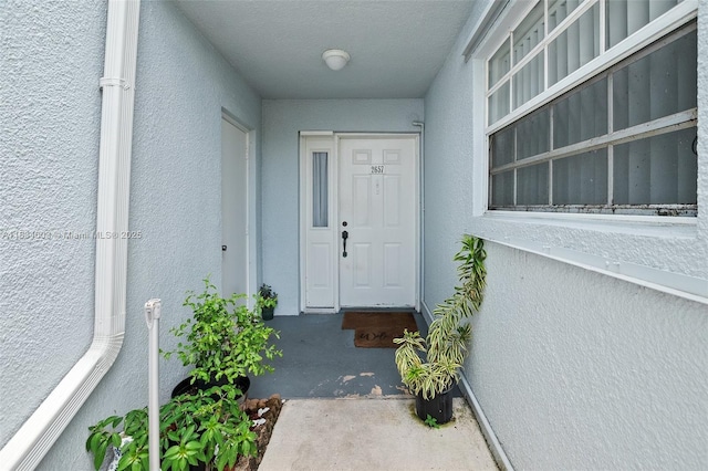 2657 SE 19th Ct Unit 103-E, Homestead, FL 33035 - view of exterior entry with stucco siding