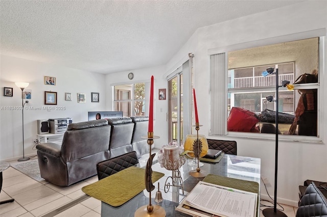 2657 SE 19th Ct Unit 103-E, Homestead, FL 33035 - dining room featuring a textured ceiling and tile patterned floors