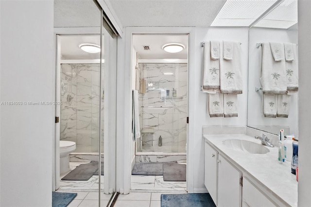 2657 SE 19th Ct Unit 103-E, Homestead, FL 33035 - bathroom with marble finish floors, a marble finish shower, and vanity