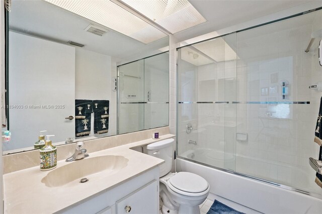 2657 SE 19th Ct Unit 103-E, Homestead, FL 33035 - full bathroom featuring vanity and bath / shower combo with glass door