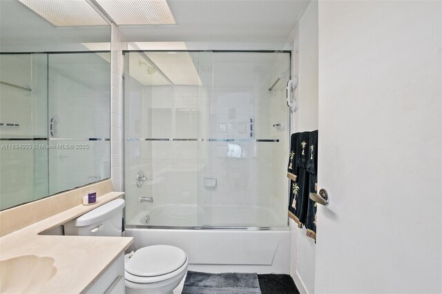 2657 SE 19th Ct Unit 103-E, Homestead, FL 33035 - bathroom featuring vanity and enclosed tub / shower combo