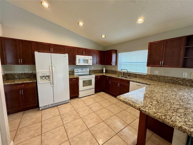 4907 SW 32nd Way, Hollywood, FL 33312 - kitchen with white appliances, open shelves, a textured ceiling, lofted ceiling, and light stone countertops