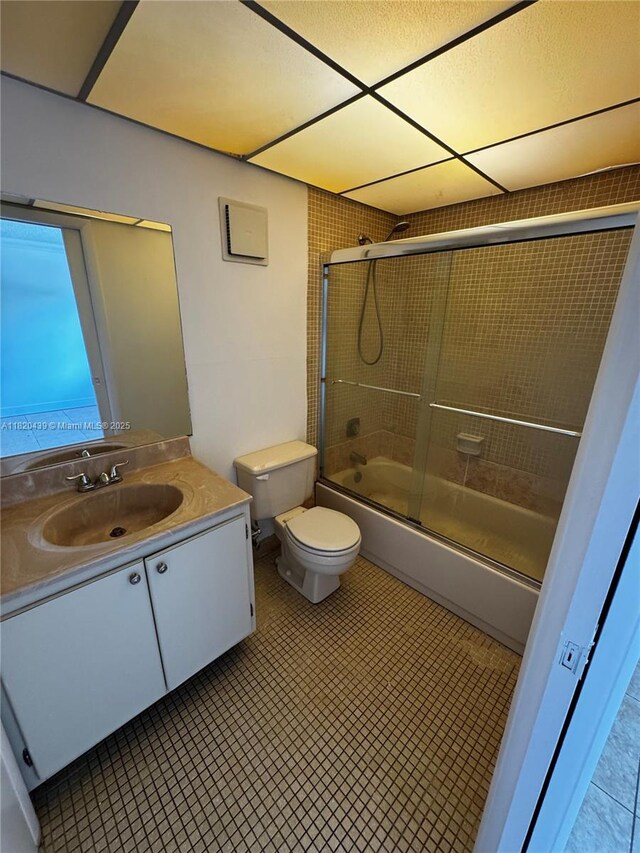 10875 SW 112th Ave Unit 206, Miami, FL 33176 - bathroom featuring vanity, combined bath / shower with glass door, and tile patterned floors