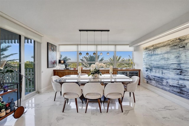 2 Grove Isle Dr Unit B410, Miami, FL 33133 - dining area featuring marble tiled flooring and baseboards