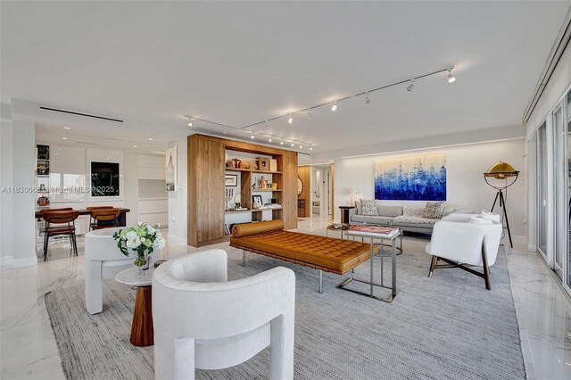 2 Grove Isle Dr Unit B410, Miami, FL 33133 - living room with rail lighting and light marble finish flooring
