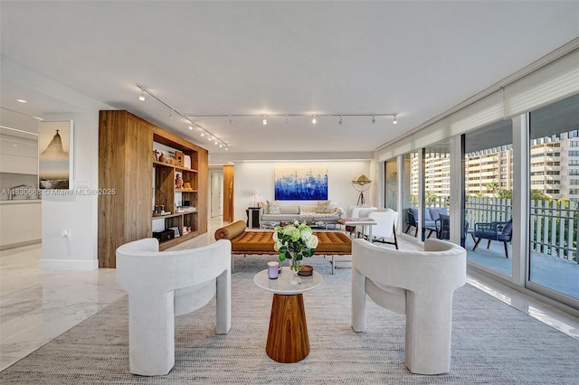 2 Grove Isle Dr Unit B410, Miami, FL 33133 - living area with track lighting and light marble finish floors