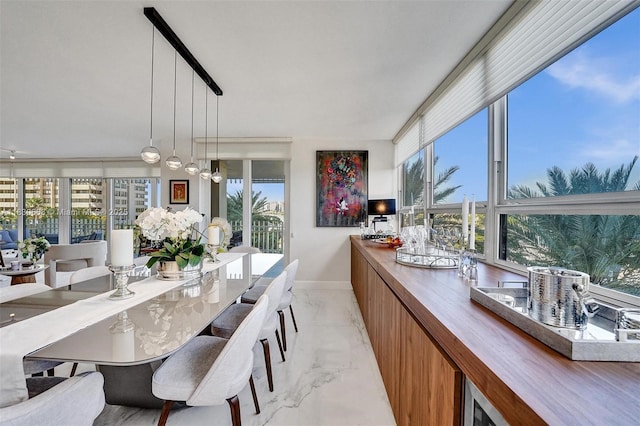 2 Grove Isle Dr Unit B410, Miami, FL 33133 - dining space with light marble finish floors and baseboards