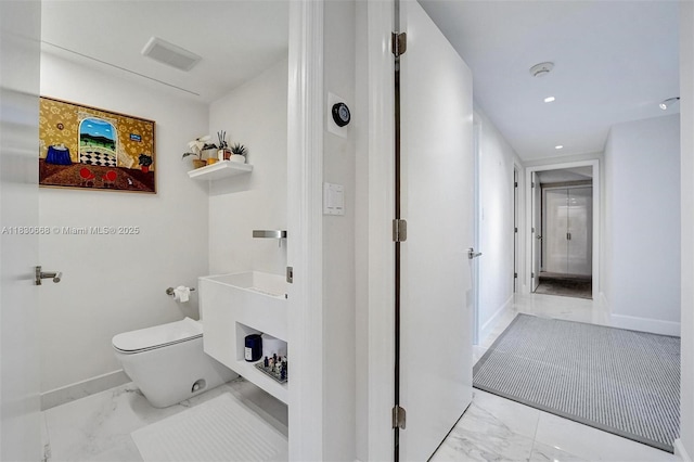 2 Grove Isle Dr Unit B410, Miami, FL 33133 - bathroom featuring marble look tiles and recessed lighting