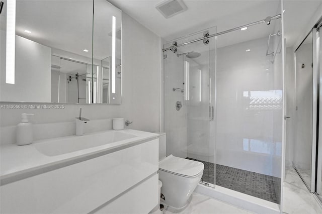 2 Grove Isle Dr Unit B410, Miami, FL 33133 - bathroom with a shower stall and vanity