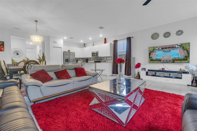 2409 NW 131st Cir, Miami, FL 33167 - living area with a chandelier and light tile patterned floors
