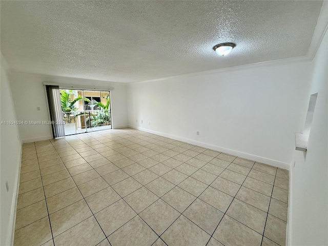 11925 NE 2nd Ave Unit B207, North Miami, FL 33161 - unfurnished room featuring a textured ceiling and light tile patterned flooring