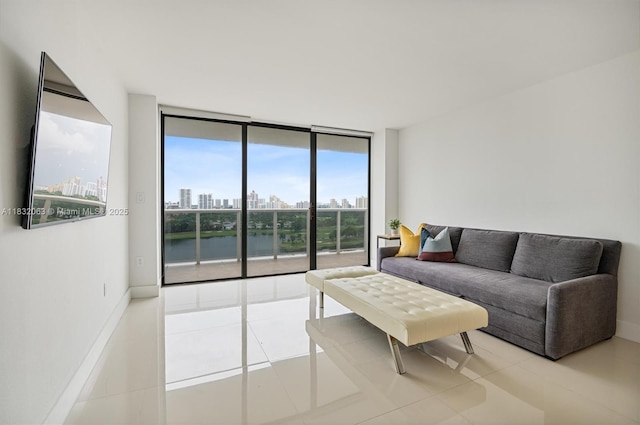3675 N Country Club Dr Unit 1705, Aventura, FL 33180 - living room featuring tile patterned flooring and a wall of windows