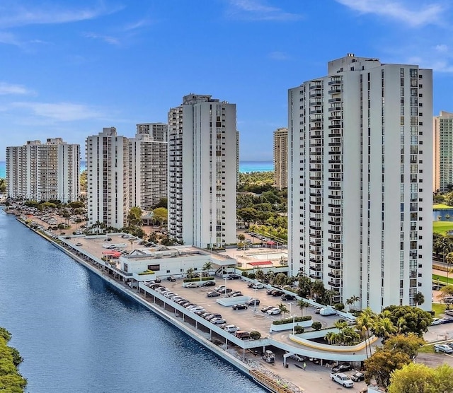 3675 N Country Club Dr Unit 1705, Aventura, FL 33180 - view of building exterior with a skyline view and a water view