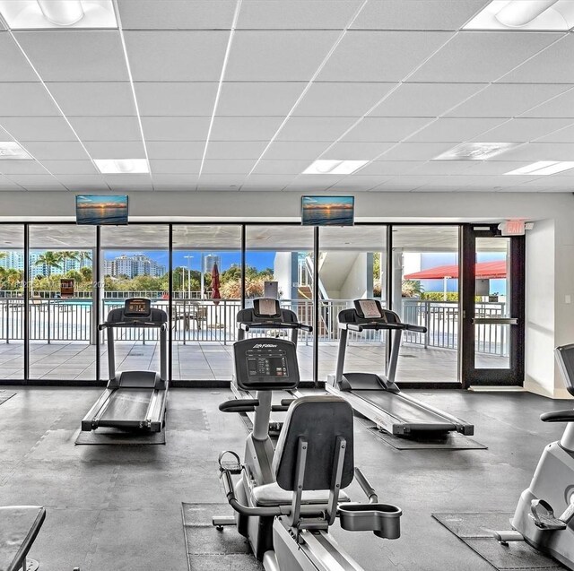 3675 N Country Club Dr Unit 1705, Aventura, FL 33180 - workout area featuring a paneled ceiling and healthy amount of natural light