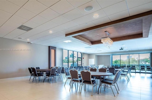 3675 N Country Club Dr Unit 1705, Aventura, FL 33180 - dining room featuring a raised ceiling, tile patterned flooring, and floor to ceiling windows