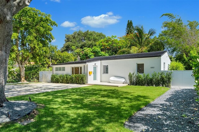 1003 NE 115th St, Biscayne Park, FL 33161 - view of front of home with stucco siding