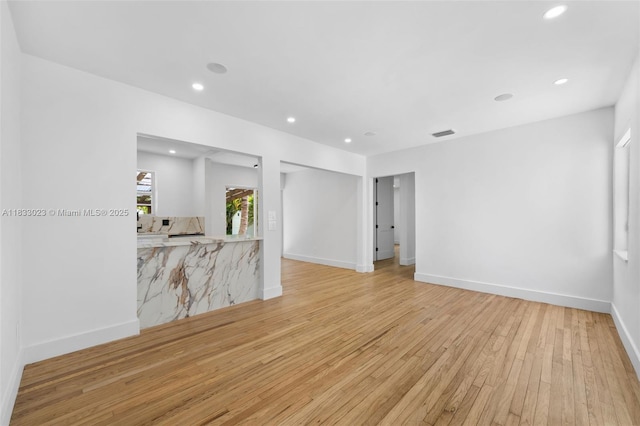 1003 NE 115th St, Biscayne Park, FL 33161 - unfurnished room featuring hardwood / wood-style flooring and recessed lighting