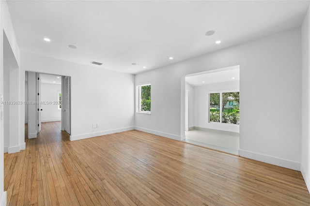 1003 NE 115th St, Biscayne Park, FL 33161 - unfurnished room with light wood-style floors and recessed lighting