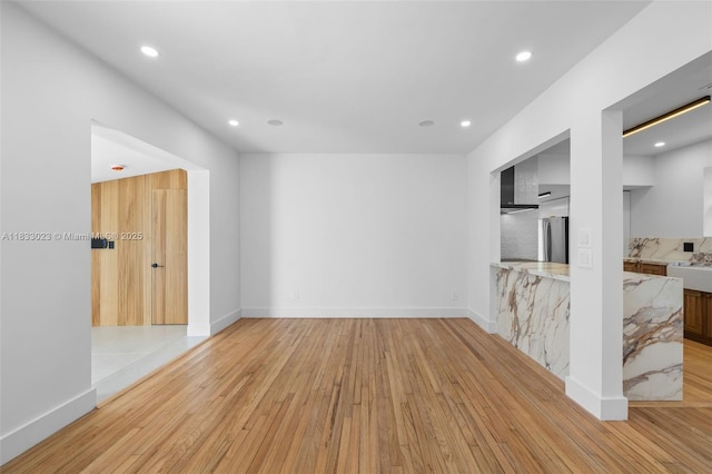 1003 NE 115th St, Biscayne Park, FL 33161 - unfurnished room with light wood-type flooring and recessed lighting