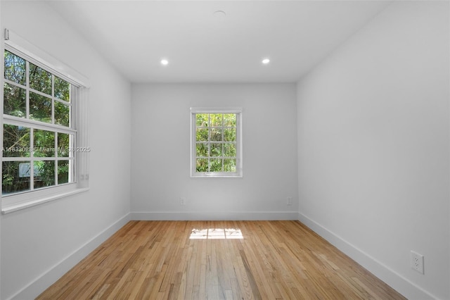 1003 NE 115th St, Biscayne Park, FL 33161 - spare room with light wood-style floors and recessed lighting