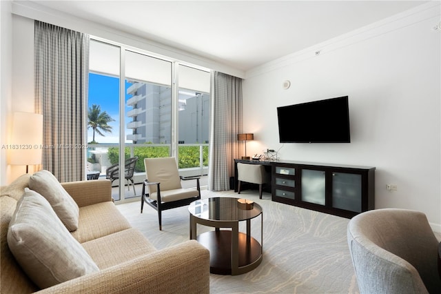 4391 Collins Ave Unit 623, Miami Beach, FL 33140 - living area with ornamental molding and a wall of windows