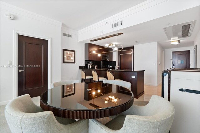4391 Collins Ave Unit 623, Miami Beach, FL 33140 - dining space featuring baseboards
