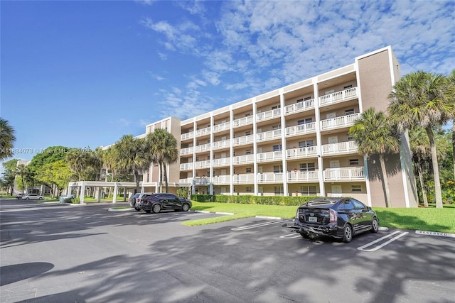 1100 NW 87th Ave Unit 306, Coral Springs, FL 33071 - view of apartment building / complex with uncovered parking