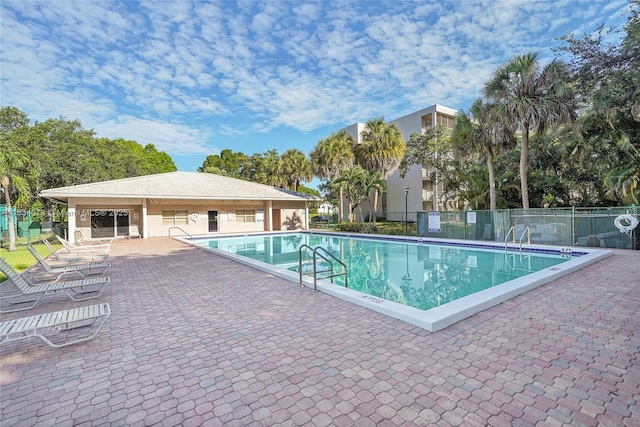 1100 NW 87th Ave Unit 306, Coral Springs, FL 33071 - community pool with a patio