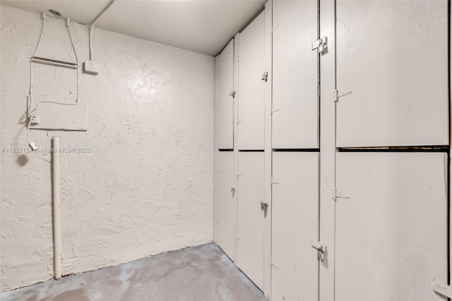 9460 Live Oak Pl Unit 407, Davie, FL 33324 - below grade area featuring a textured wall
