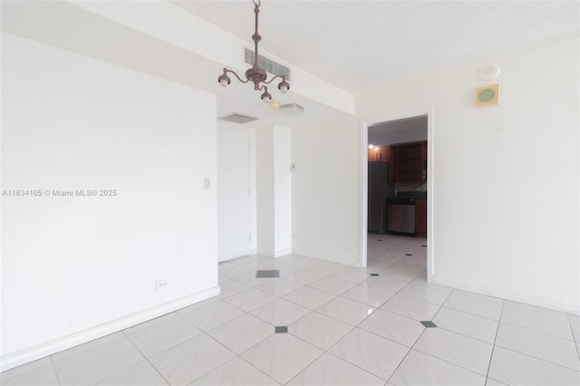 230 174th St Unit 2207, Sunny Isles Beach, FL 33160 - empty room featuring a chandelier