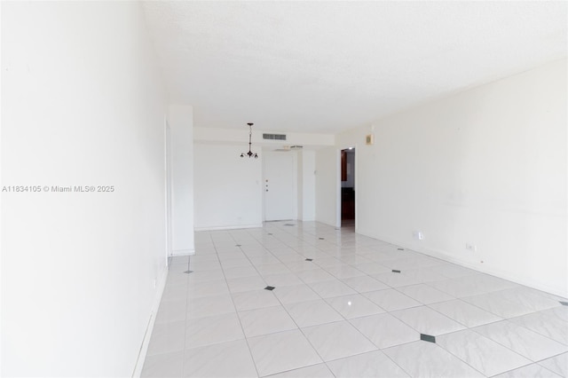 230 174th St Unit 2207, Sunny Isles Beach, FL 33160 - empty room featuring baseboards