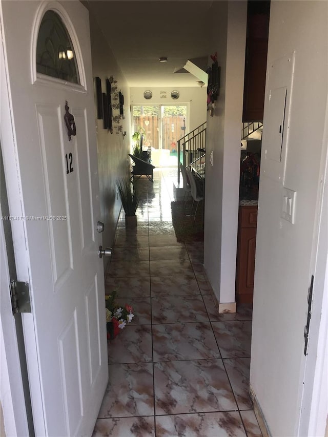 16700 NW 55th Ave Unit 12, Miami Gardens, FL 33055 - hallway featuring baseboards