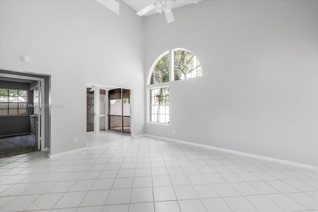 5366 214th Ct S, Boca Raton, FL 33486 - spare room featuring a ceiling fan, a towering ceiling, and plenty of natural light
