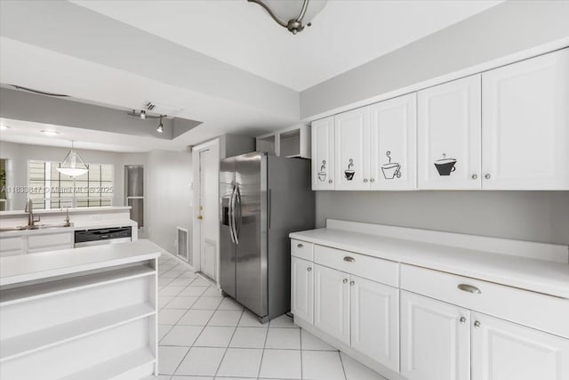 5366 214th Ct S, Boca Raton, FL 33486 - kitchen featuring stainless steel appliances, white cabinets, light tile patterned floors, light countertops, and hanging light fixtures