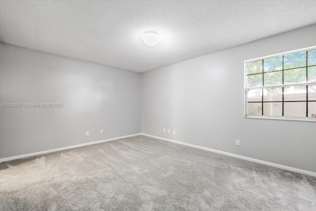 5366 214th Ct S, Boca Raton, FL 33486 - carpeted spare room with a textured ceiling