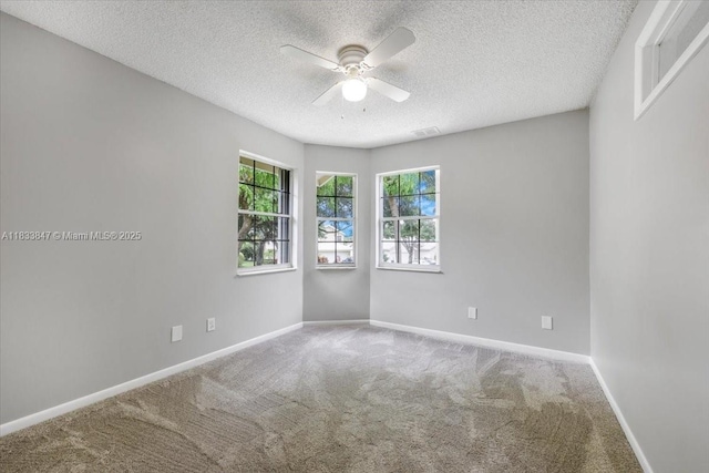 5366 214th Ct S, Boca Raton, FL 33486 - spare room featuring carpet floors, a textured ceiling, and ceiling fan