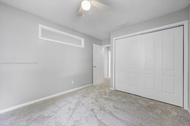 5366 214th Ct S, Boca Raton, FL 33486 - unfurnished bedroom with carpet, a closet, a textured ceiling, and a ceiling fan