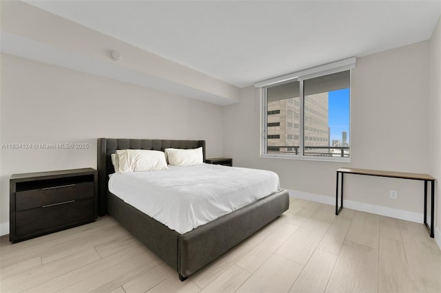 325 S Biscayne Blvd Unit 2816, Miami, FL 33131 - bedroom with light wood finished floors and baseboards